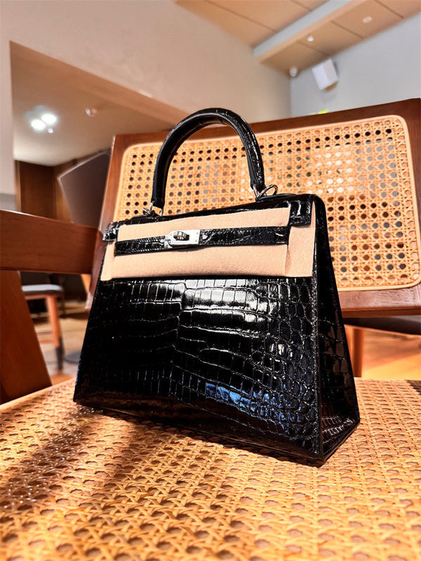 Side view of poised structured handbag