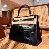 Side view of poised structured handbag