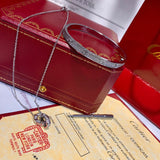 Front view of Cartier unisex jewelry piece