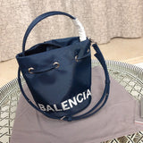 Front view of elevated polished women's handbag – women's luxury handbag