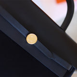  crossbody bag close-up of hardware and finish 23