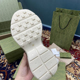 Side profile of Gucci neutral cream sneakers breathable knit upper