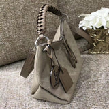Close-up detail of statement premium women's handbag – women's luxury accessory