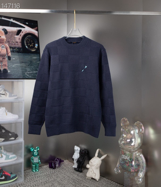 Close-up detail shot of Louis Vuitton luxury clothing with tailored silhouette