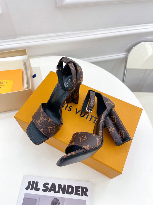Louis Vuitton Tan High-Top Sneakers - Angled View