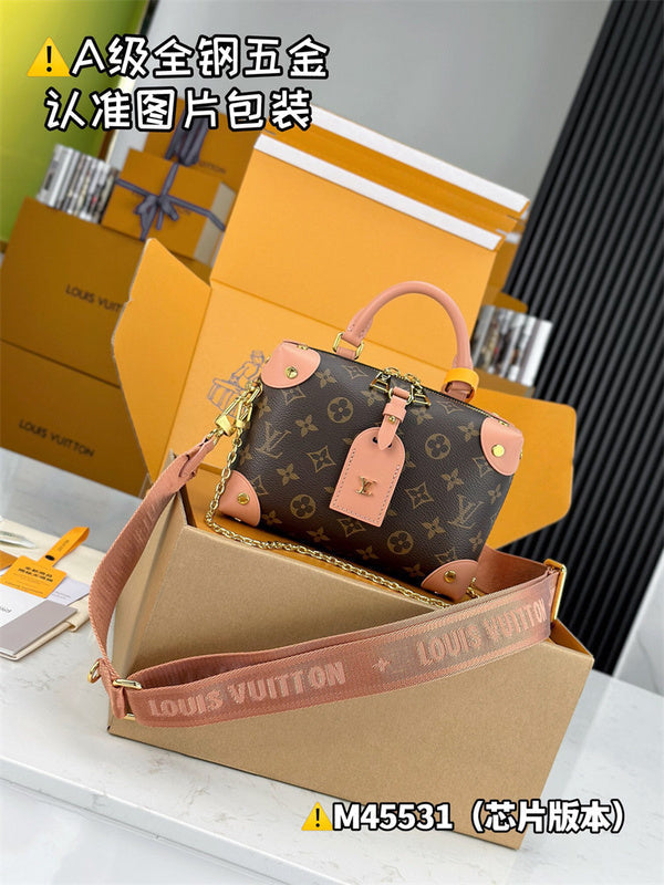  clean-lined top-handle bag styled with outfit