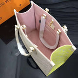Front view of chic everyday-luxe women's handbag – women's luxury accessory