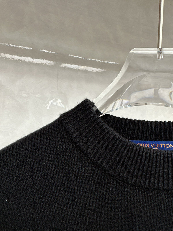 Close-up detail shot of Louis Vuitton luxury clothing with tailored silhouette