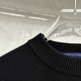 Close-up detail shot of Louis Vuitton luxury clothing with tailored silhouette