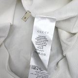Back view of Gucci luxury clothing with label-forward styling