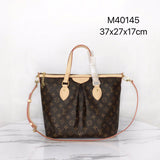 Side profile of classic everyday-luxe women's handbag – women's designer-style accessory