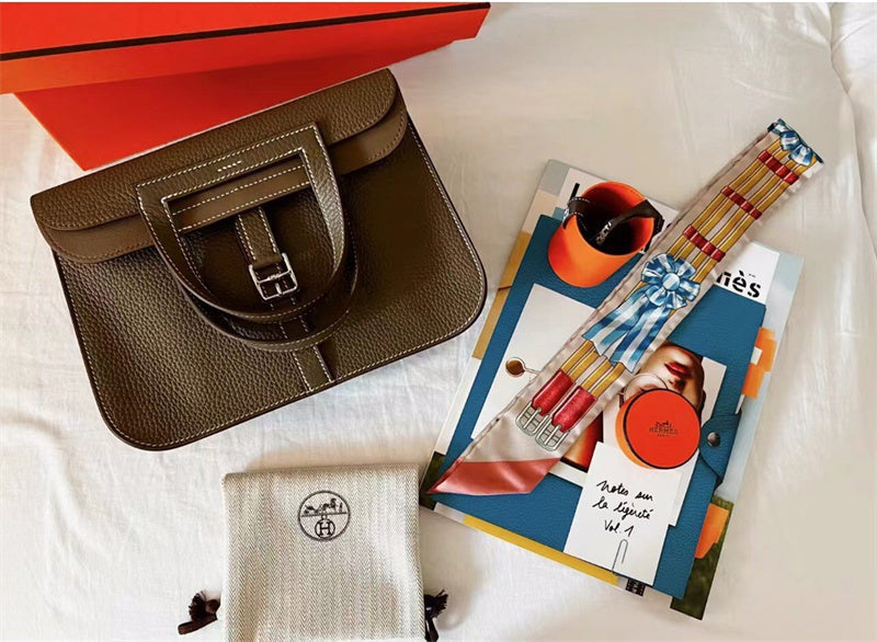  Streamlined shopper bag carried on shoulder 28
