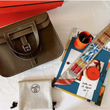  Streamlined shopper bag carried on shoulder 28