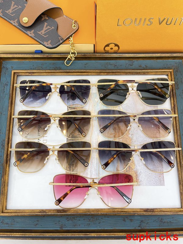 Close-up detail view of Louis Vuitton unisex sunglasses