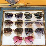Close-up detail view of Louis Vuitton unisex sunglasses