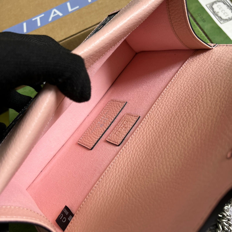Side profile of chic sleek women's handbag – women's statement bag