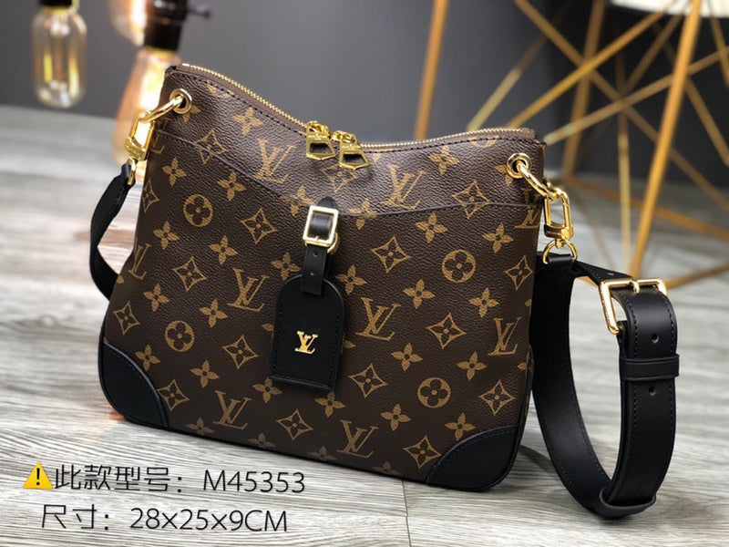 Side profile of polished structured women's handbag – women's luxury accessory