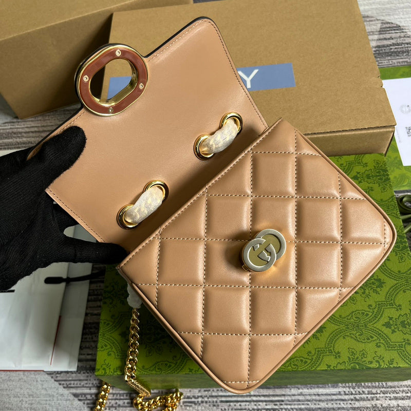 Top view of classic polished women's handbag – women's designer-style accessory