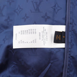 Close-up detail shot of Louis Vuitton luxury clothing with monogram-inspired silhouette