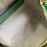 Side profile of chic polished women's handbag – women's statement bag