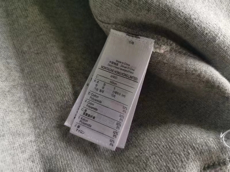 Side profile of Lacoste luxury clothing with logo-detail design