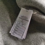 Side profile of Lacoste luxury clothing with logo-detail design