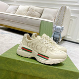 Gucci Designer sneakers in muted earth tones cushioned comfort fit front view