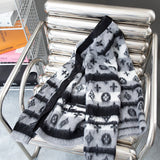 Close-up detail shot of Louis Vuitton luxury clothing with tailored silhouette