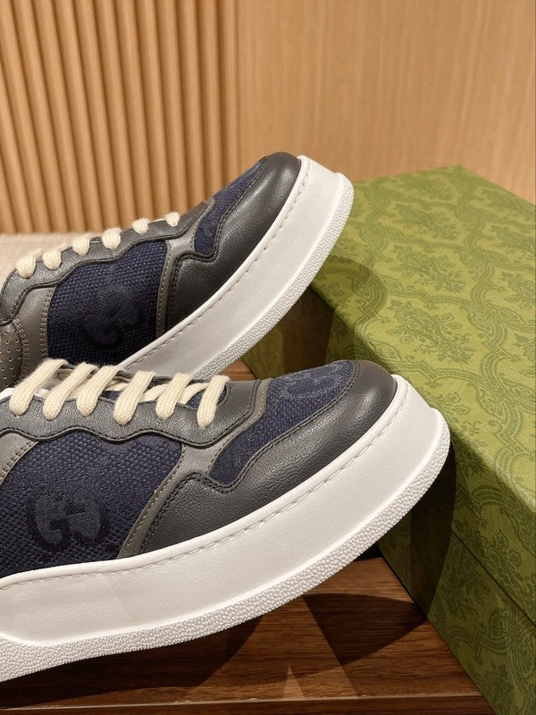 Side profile of Gucci two-tone sneakers streetwear statement look