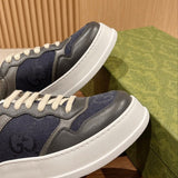 Side profile of Gucci two-tone sneakers streetwear statement look
