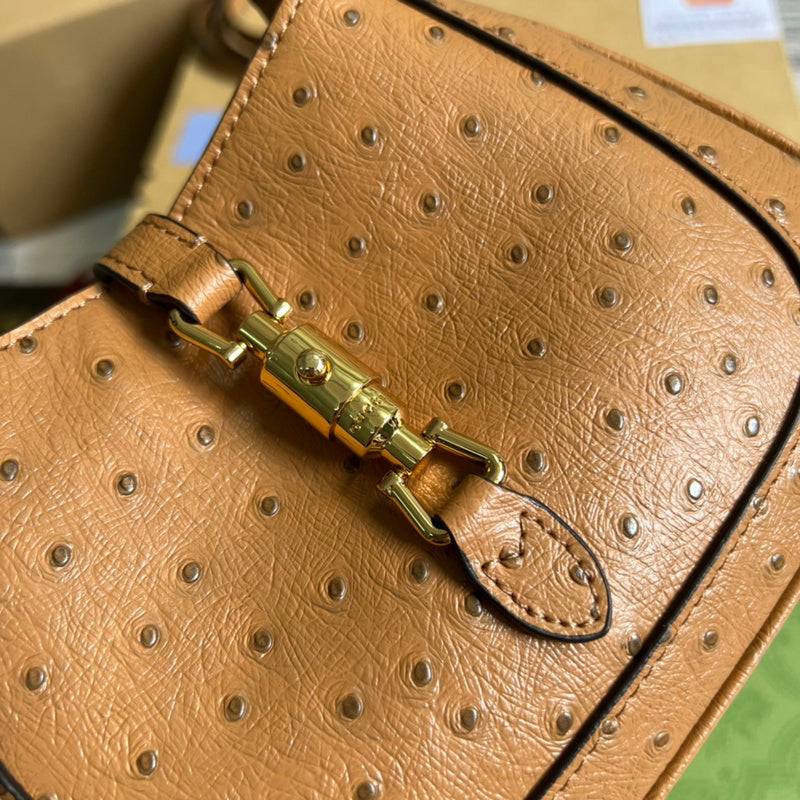 Styled lifestyle shot of refined signature women's handbag – women's luxury accessory