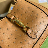Styled lifestyle shot of refined signature women's handbag – women's luxury accessory