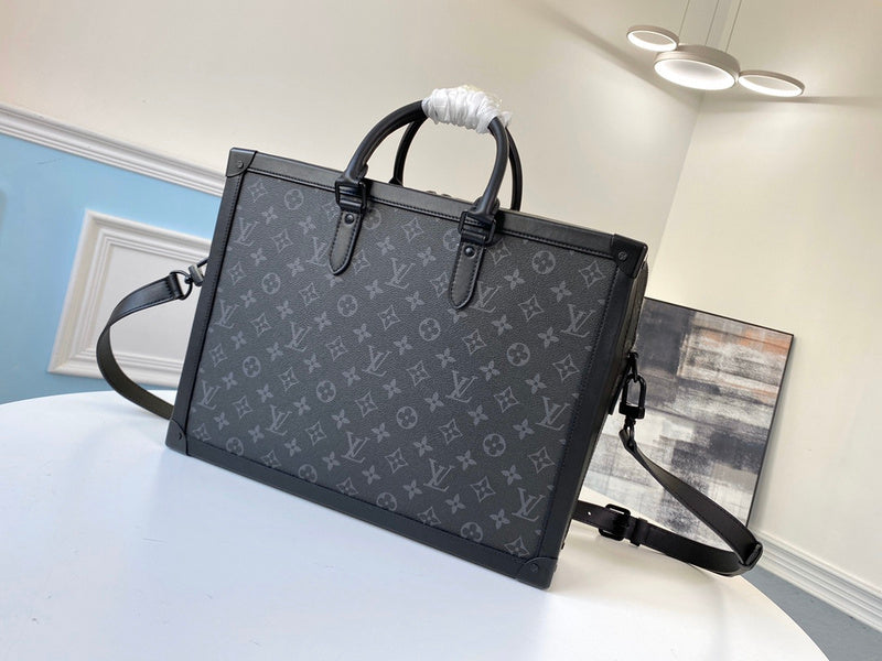 Side profile of signature statement women's handbag – women's luxury accessory