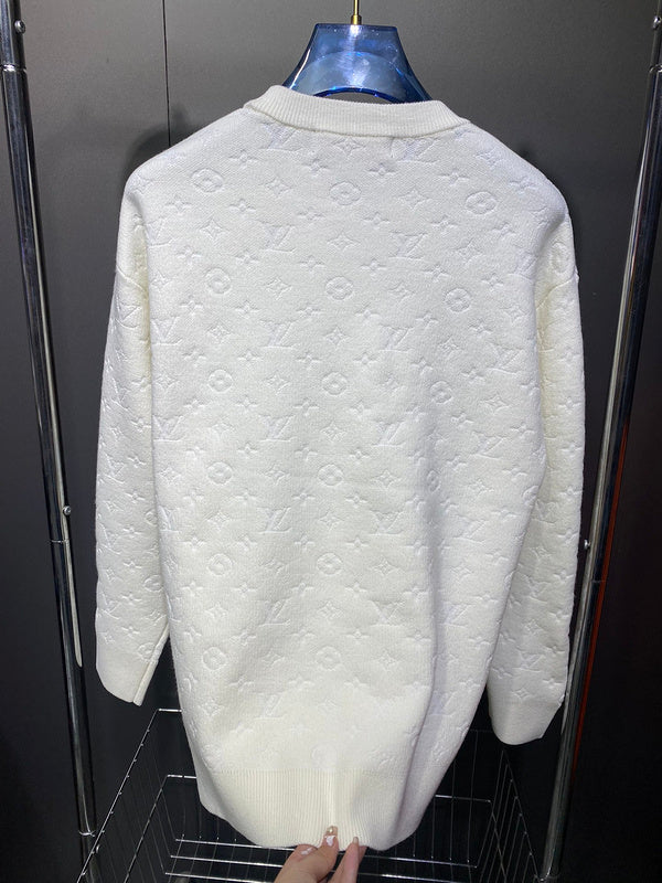 Flat lay presentation of Louis Vuitton luxury clothing with runway-inspired design