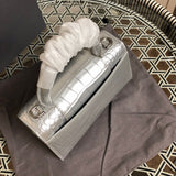 Top view of modern classic women's handbag – women's luxury accessory