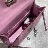 Side view of tailored structured handbag