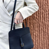 Close-up detail of understated bag design