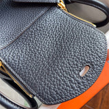  clean-lined handbag detail view showing craftsmanship 14