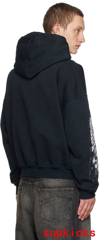 Side profile of Rhude luxury clothing with signature branding