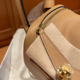 Side view of fluid structured handbag