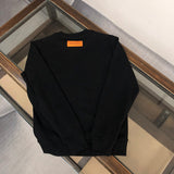 Close-up detail shot of Louis Vuitton luxury clothing with tailored silhouette