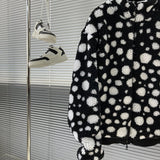 Side profile of Louis Vuitton luxury clothing with everyday silhouette