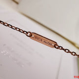 Side view of Van Cleef & Arpels unisex jewelry piece