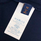 Flat lay presentation of Louis Vuitton cotton t-shirt with label-forward styling