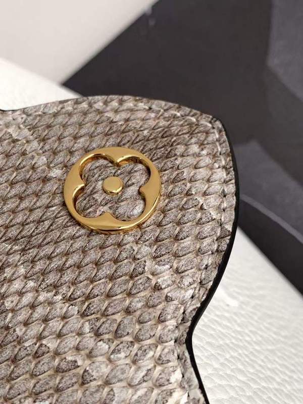 Top view of polished chic women's handbag – women's luxury accessory