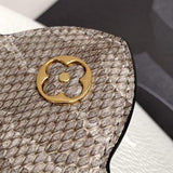 Top view of polished chic women's handbag – women's luxury accessory