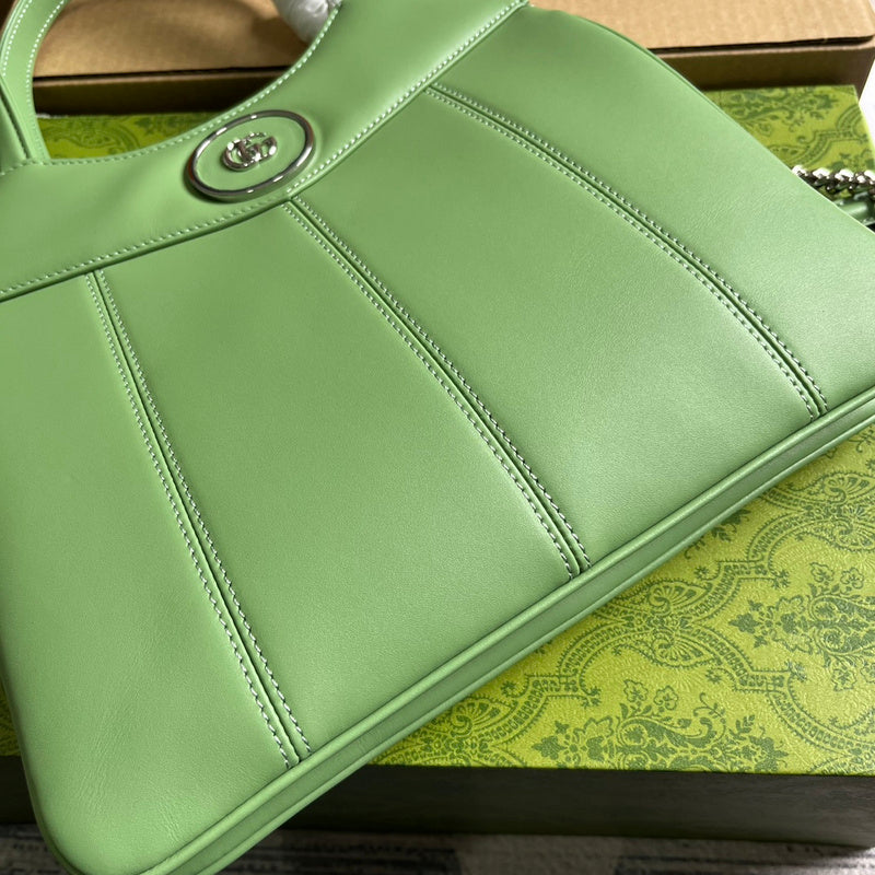 Styled lifestyle shot of refined classic women's handbag – women's everyday handbag