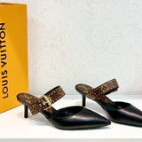 Close-up detail view of Louis Vuitton luxury piece style No.159