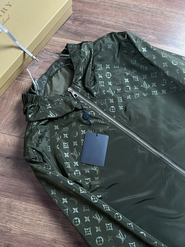 Close-up detail shot of Louis Vuitton luxury clothing with logo-detail design