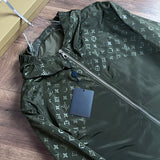 Close-up detail shot of Louis Vuitton luxury clothing with logo-detail design